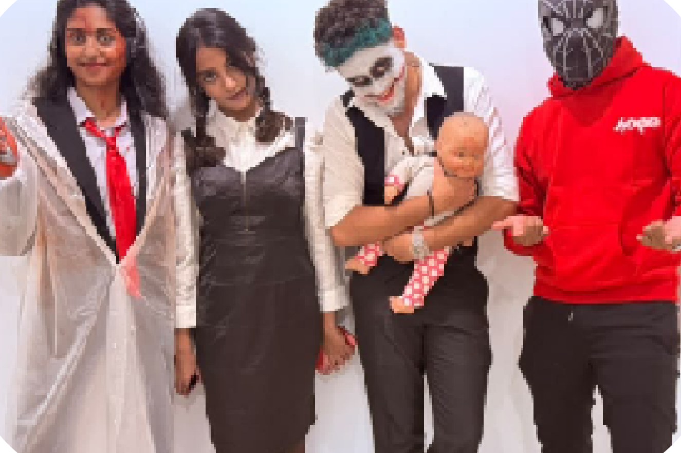 Team members in costume at a themed office day